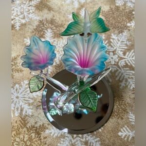 Glass Figurine with Butterfly on Flower. Has mirrored base. Great Condition